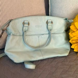 American leather satchel in a cool sage, mint green color
